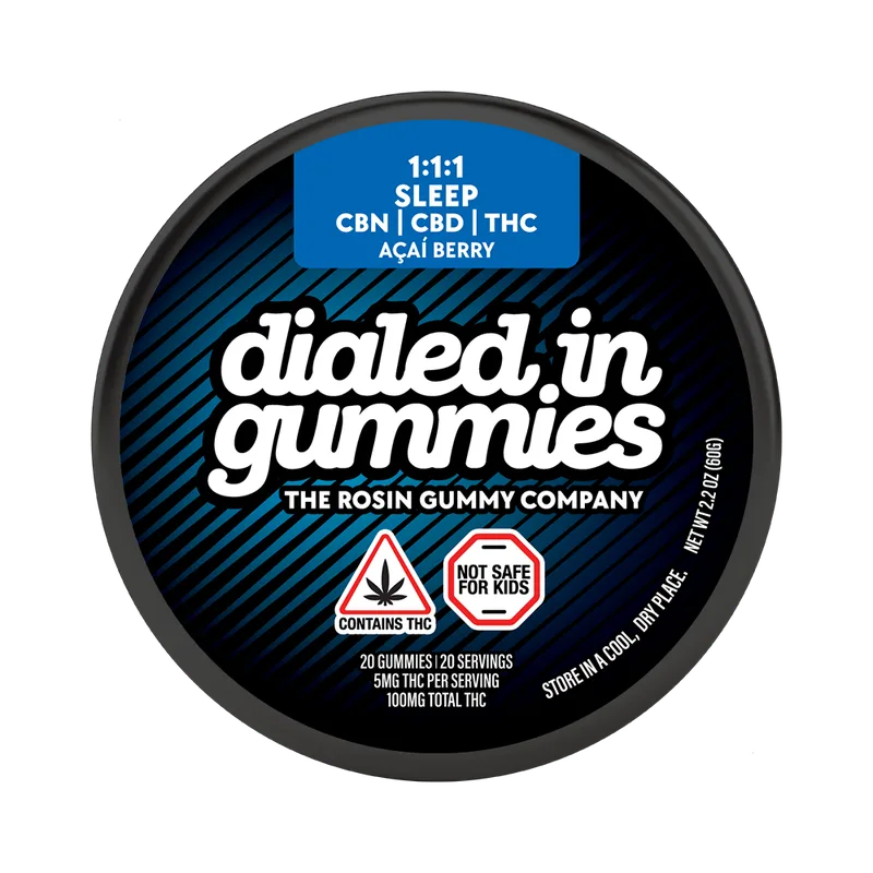 Round black Dialed In Gummies tin with a blue label reading 1:1:1 CBN, CBD, THC, acai berry.
