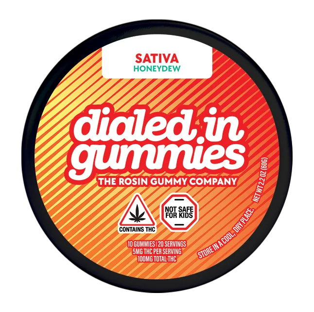 Round Dialed In Gummies tin in orange and red stripes, labeled sativa, honeydew.
