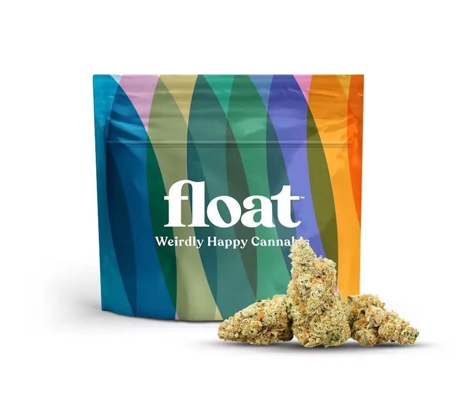 Colorful striped Float pouch with light green cannabis buds in front of it.