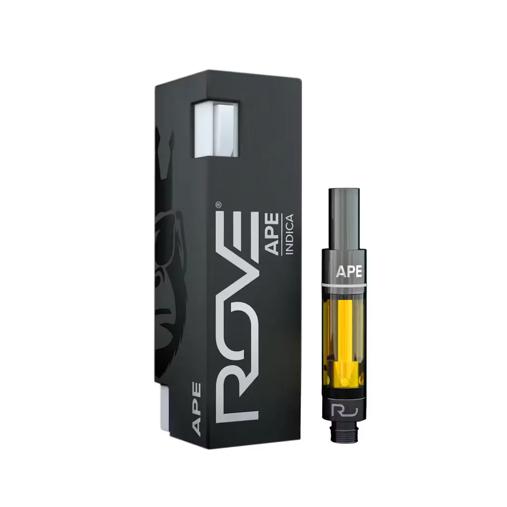 Black and silver Rove Ape indica box beside a 510 cartridge with golden oil and a black mouthpiece.